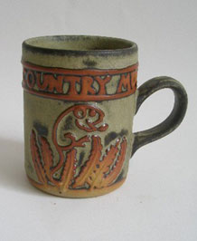 1960s TREMAR STUDIO POTTERY COUNTRY MUG WITH RAISED FIELD MOUSE  DESIGN