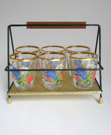     SIX VINTAGE SHOT GLASSES IN STAND