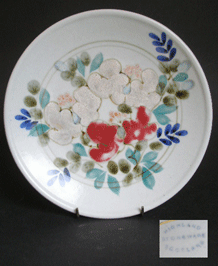    HIGHLAND STONEWARE VARIED FLORAL 10 INCH PLATE